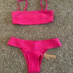 Skims bathing suit, new with tags, never worn, tried on once, lg bottoms, md top